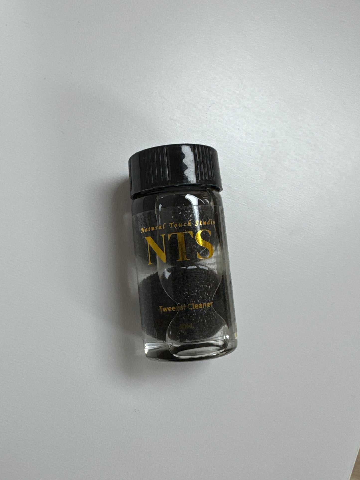 Tweezer cleaner