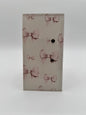 Bow Lash Tile